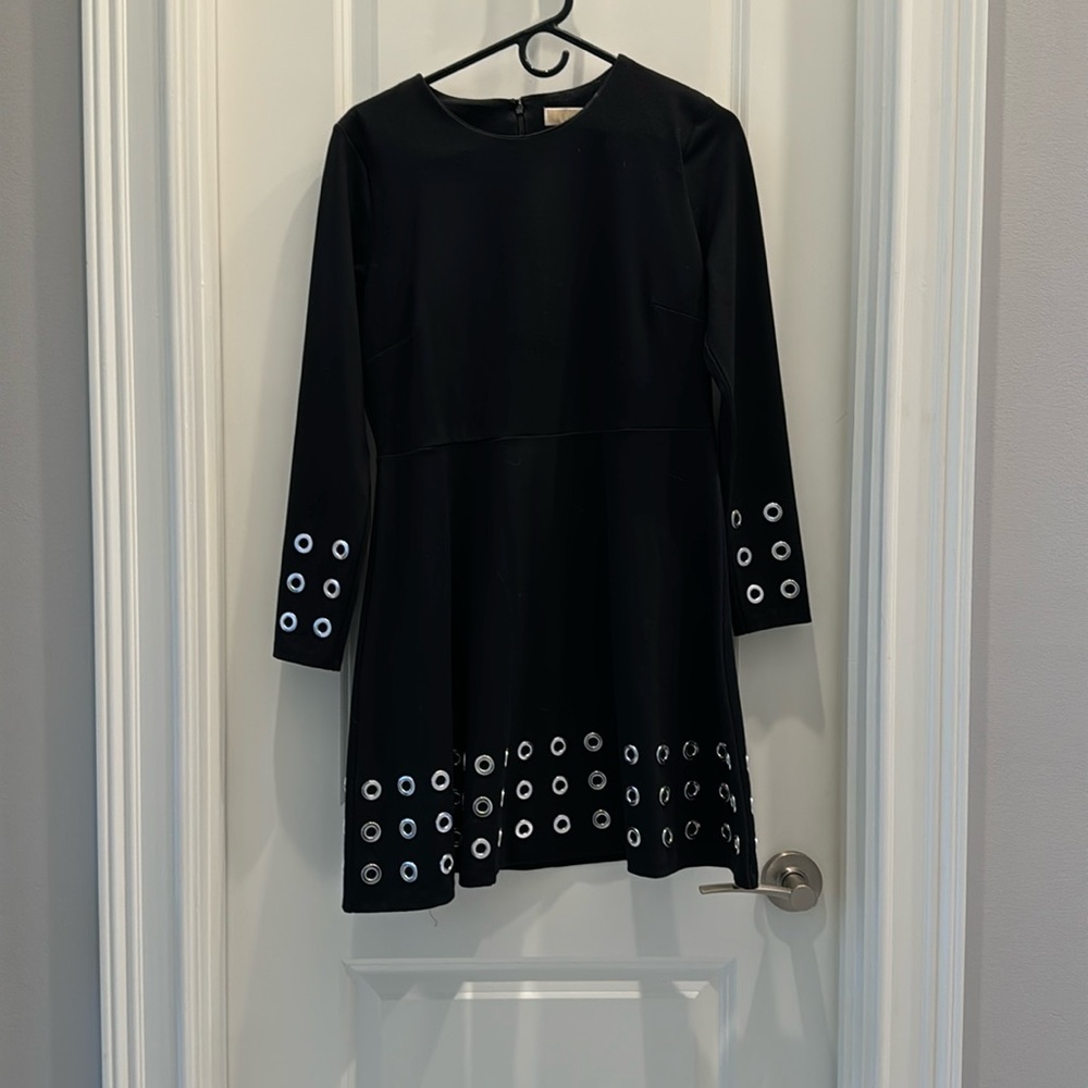 Little black dress with embellished details by Michael Kors